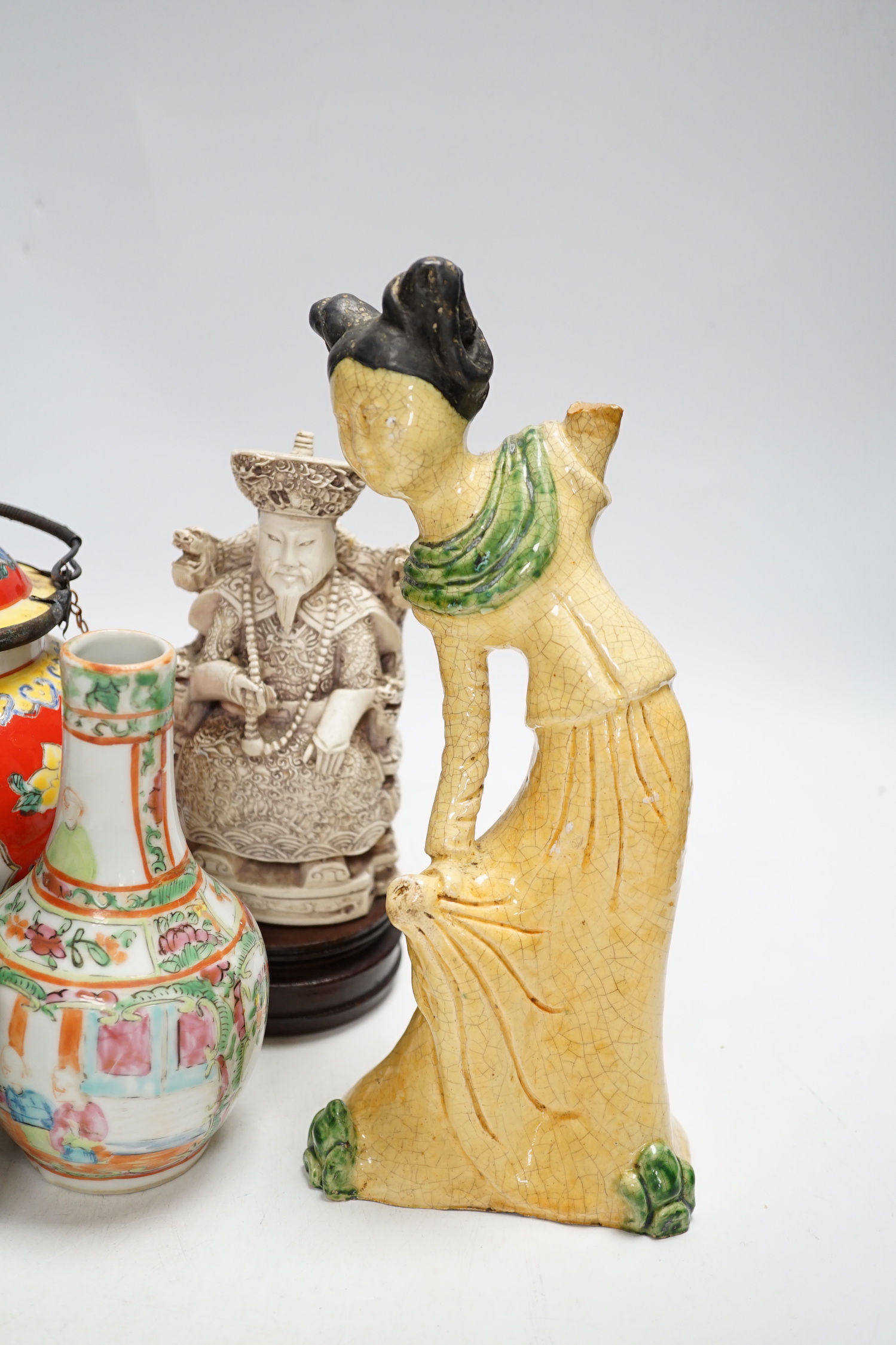 A group of Chinese ceramics 18th century and later, including a bottle vase, a water pipe vessel, box and cover, three bowls, a Tang style figure of a lady, a Yixing teapot, together with a resin figure of an emperor